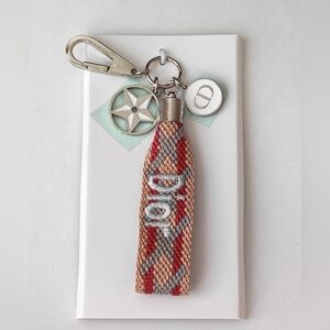 Dior Woven Keychain with logo charm